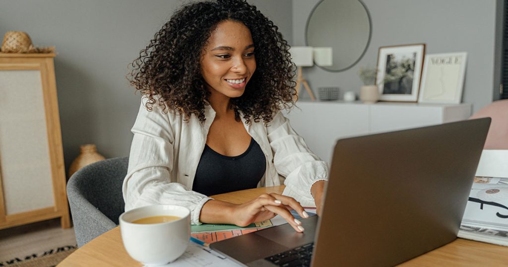 Young lady working in her home office